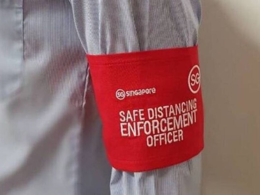 The arm band worn by safe distancing enforcement officers. The arm band worn by safe distancing enforcement officers.