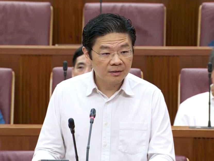 Deputy Prime Minister Lawrence Wong speaking in Parliament on April 21, 2023.