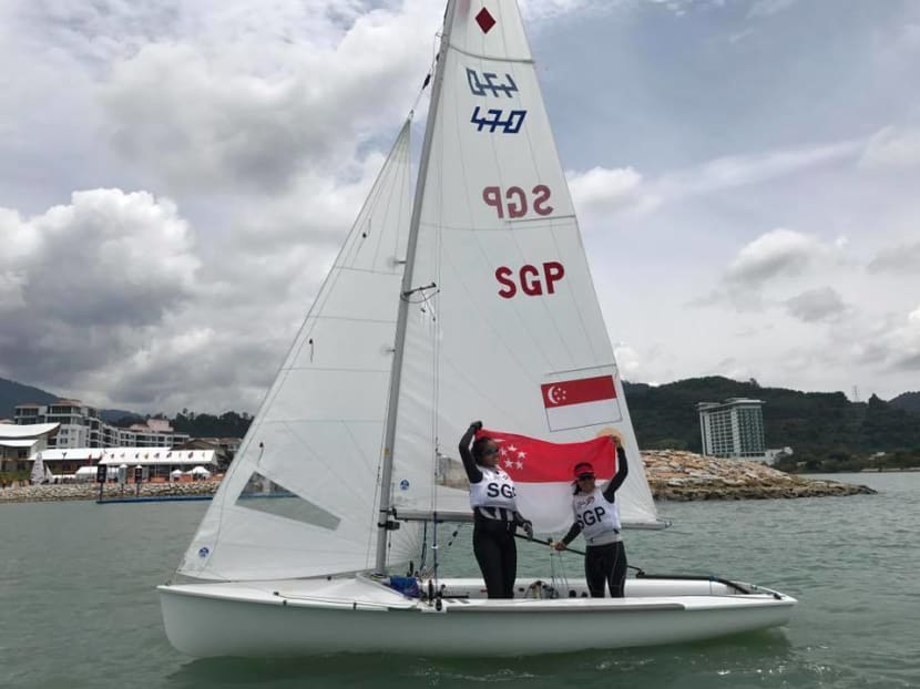Elisa Yukie Yokoyama and Cheryl Teo celebrate winning at the SEA Games. Photo: Singapore Sailing Federation