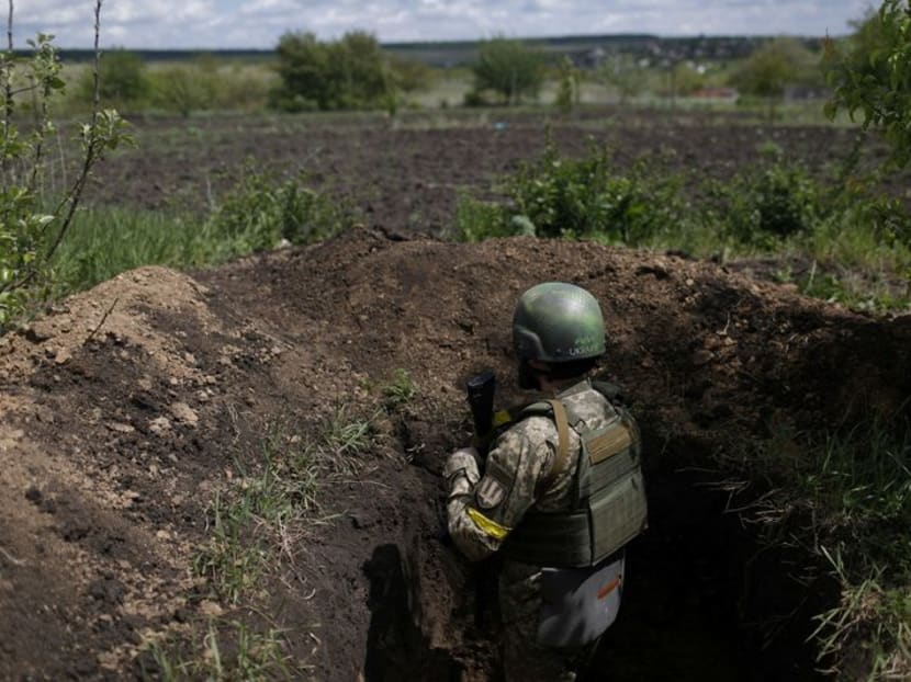 Ukrainian serviceman Shaba stays at a trench used as an observation point at a frontline area in Ruska Lozava, a village retaken by the Ukrainian forces, amid Russia's attack on Ukraine, in Kharkiv region, Ukraine, May 15, 2022.