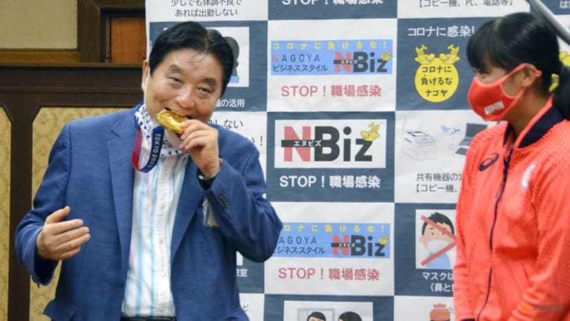 Olympics-Medal chomp grosses out Japan and riles Toyota Olympics-Medal chomp grosses out Japan and riles Toyota