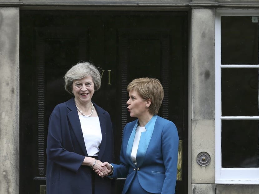 UK Prime Minister Theresa May with Scotland's First Minister Nicola Sturgeon at Bute House in Edinburgh, Scotland. Photo: Reuters