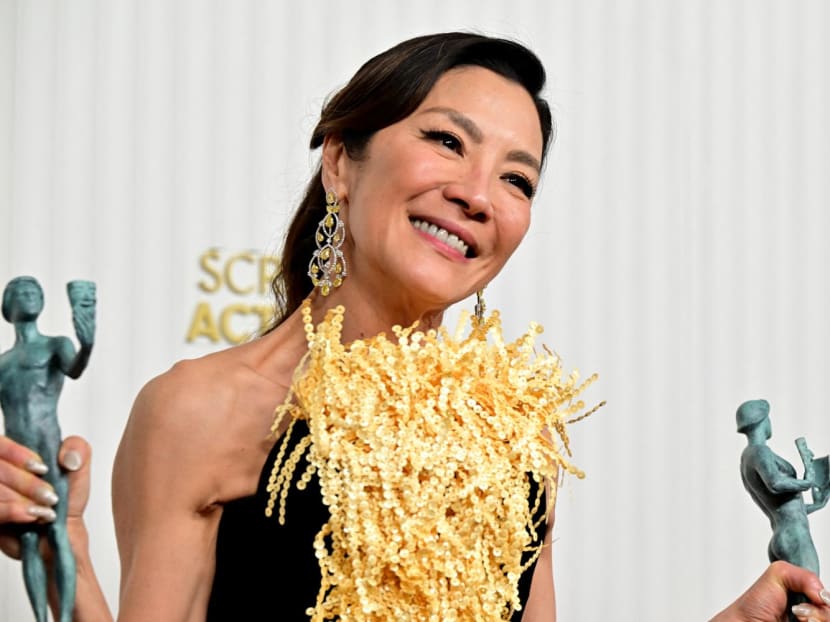 Malaysian actress Michelle Yeoh poses with the awards for Outstanding Performance by a Female Actor in a Leading Role and Outstanding Performance by a Cast in a Motion Picture Everything Everywhere All at Once during the 29th Screen Actors Guild Awards at the Fairmont Century Plaza in Century City, California, on Feb 26, 2023.
