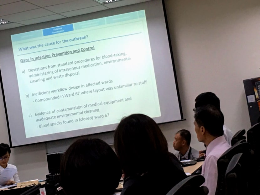 The independent review committee held a media briefing and released its report on the SGH hepatitis C outbreak to the media on Dec 8, 2015. Photo: Raymond Tham The independent review committee held a media briefing and released its report on the SGH hepatitis C outbreak to the media on Dec 8, 2015. Photo: Raymond Tham