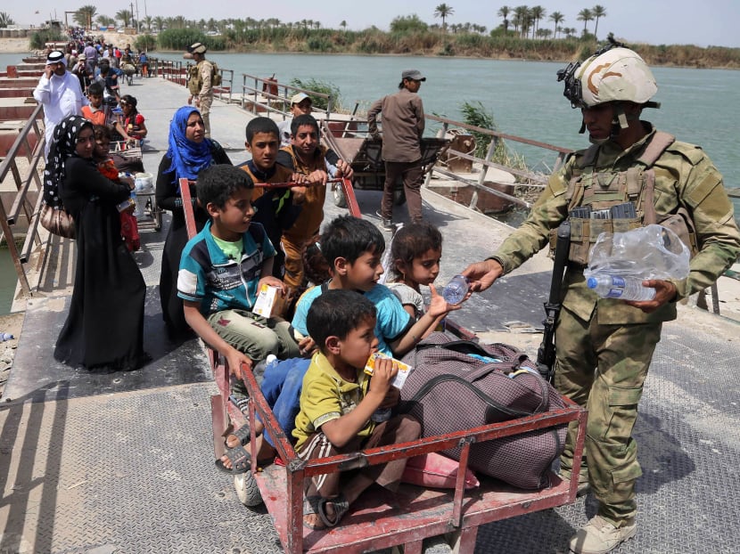 Gallery: Report: 2.2 million Iraqis displaced by Islamic State group
