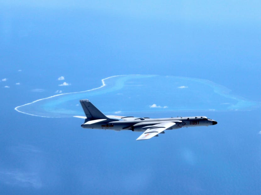 A Chinese H-6K bomber patrolling islands and reefs, including Huangyan Dao, in the South China Sea. A Framework for a Code of Conduct for the area was agreed by Asean countries and China recently, though it appears to be open to interpretation. Photo: AP