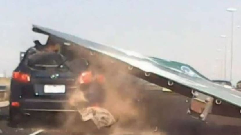 Woman in Australia survives falling traffic sign which crushed car Woman in Australia survives falling traffic sign which crushed car