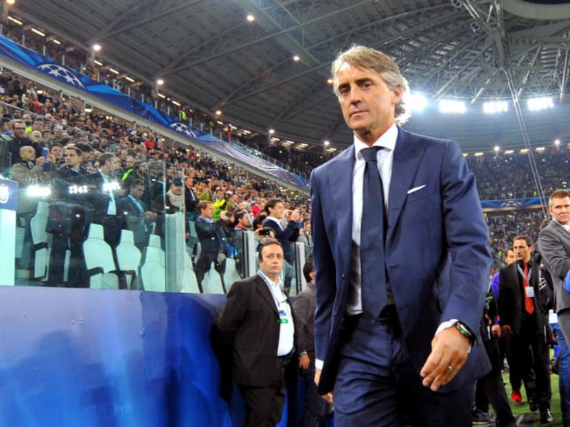 Roberto Mancini, who left Inter Milan last August, won the Premier League with City in 2012. Photo: AP