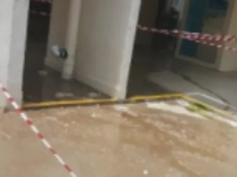 A cordoned off area at a void deck in Ang Mo Kio following an overflow of fecal matter. A cordoned off area at a void deck in Ang Mo Kio following an overflow of fecal matter.