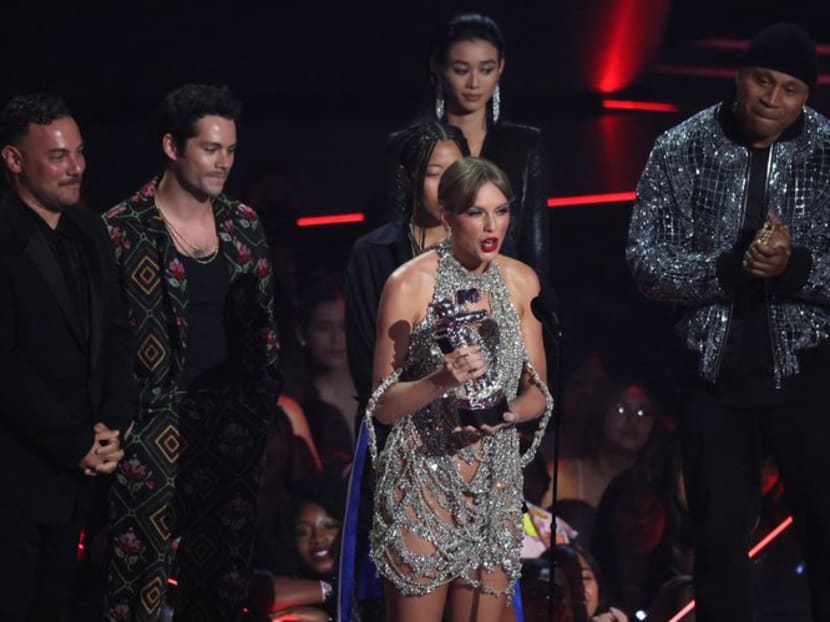 Taylor Swift wins top MTV video award, announces new album Taylor Swift wins top MTV video award, announces new album