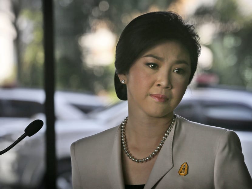 Thailand's Prime Minister Yingluck Shinawatra gets emotional after speaking at a press conference, in Bangkok, Thailand on Dec 10, 2013. Photo: AP