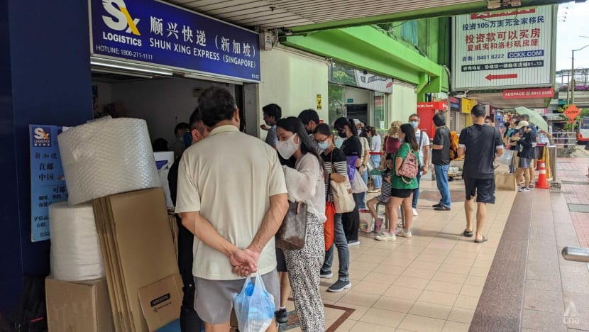 Worried China nationals in Singapore queue to send Panadol to relatives back home