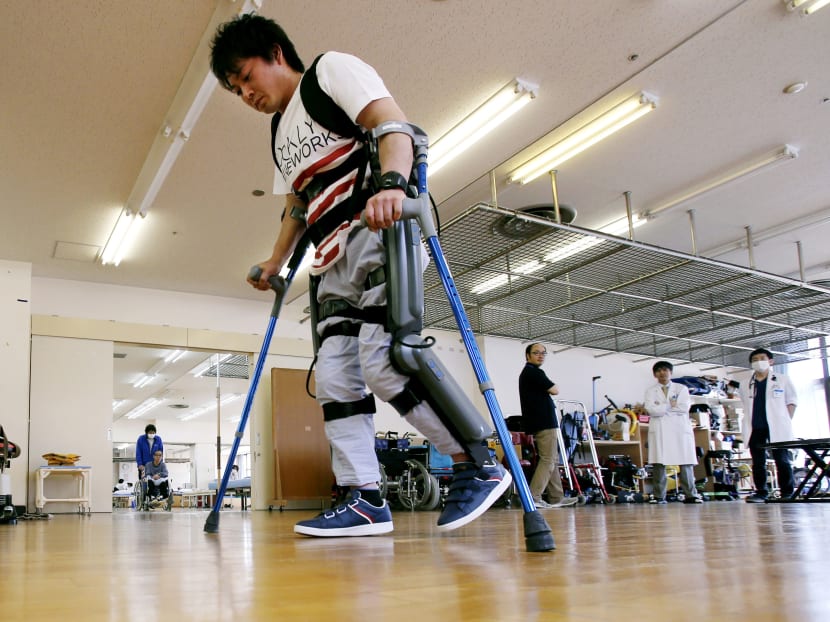 Exoskeleton that helps paralysed walk faces barrier in Japan