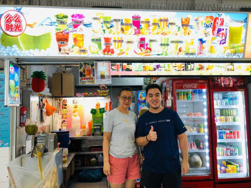 Mr Darren Teo of 51 Noodle House and the fruit juice vendor whom he has helped, by offering her drinks as an option for his customers, in an undated photograph. Mr Darren Teo of 51 Noodle House and the fruit juice vendor whom he has helped, by offering her drinks as an option for his customers, in an undated photograph.