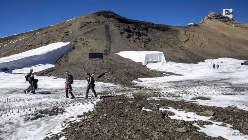 Rocky path revealed between Swiss glaciers in extreme melt season Rocky path revealed between Swiss glaciers in extreme melt season