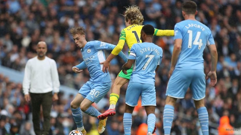Soccer-Grealish on target as Man City put five past hapless Norwich