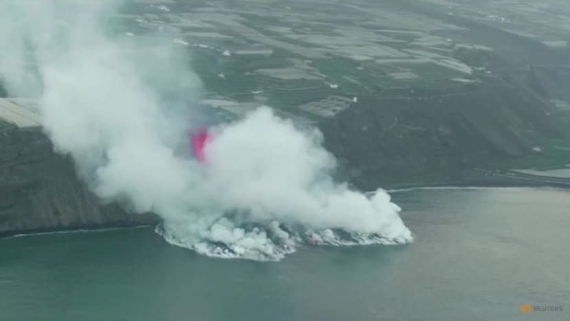 Spain's La Palma gains ground from the sea as lava piles up Spain's La Palma gains ground from the sea as lava piles up