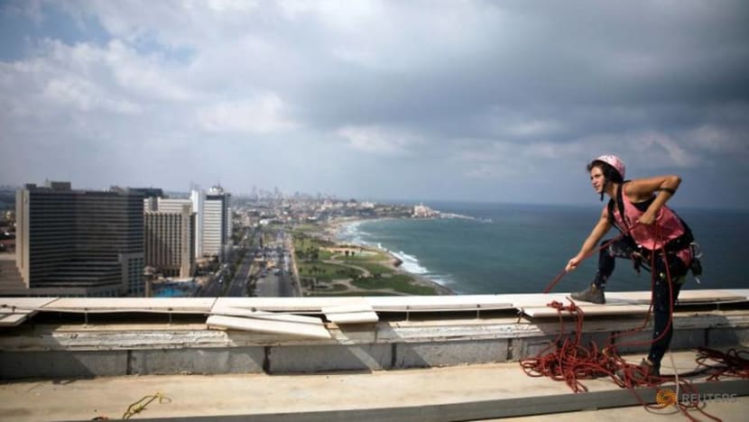 Squeegee selfies: Tel Aviv tower-washer is rising TikTok star Squeegee selfies: Tel Aviv tower-washer is rising TikTok star