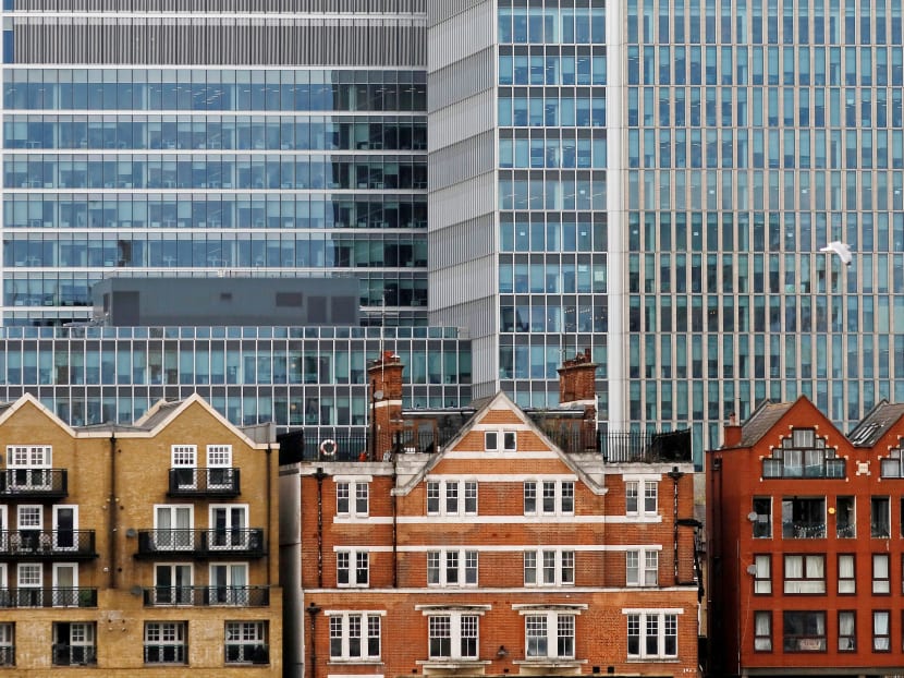 Apartment buildings and skyscrapers in London. Market watchers say that while a cheaper pound could lead to an uptick of interest in UK properties by Singapore investors, the weaker sterling also erodes the value of assets held in Britain. Photo: REUTERS