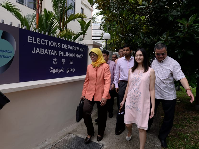 Presidential hopeful Halimah Yacob (left) and members of her campaign team arriving at the Elections Department, on August 30, 2017. Photo: Robin Choo/TODAY Presidential hopeful Halimah Yacob (left) and members of her campaign team arriving at the Elections Department, on August 30, 2017. Photo: Robin Choo/TODAY