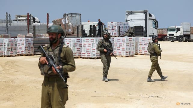 Israel allows trucks from newly reopened Erez crossing into Gaza after US pressure