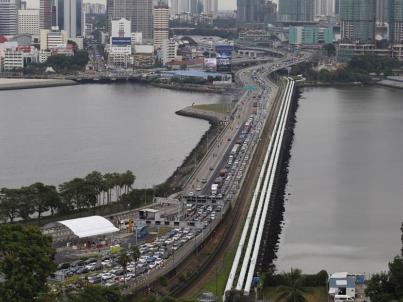 Inconsiderate drivers add to traffic congestion at checkpoints, says K Shanmugam; queue-cutting a common gripe among motorists