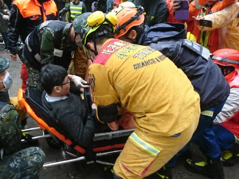 Photo of the day: Rescue workers tend to a survivor pulled from wreckage after an earthquake hit Hualien, Taiwan on Feb 7, 2018. Photo: Reuters