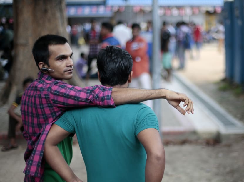 Migrant workers gather at an open field at Little India on Nov 29, 2015. TODAY file photo Migrant workers gather at an open field at Little India on Nov 29, 2015. TODAY file photo