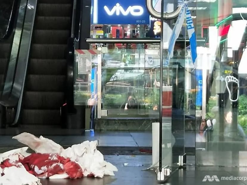 Pieces of tissue paper soaked in blood seen at the entrance of Orchard Towers on Jul 2, 2019. Pieces of tissue paper soaked in blood seen at the entrance of Orchard Towers on Jul 2, 2019.