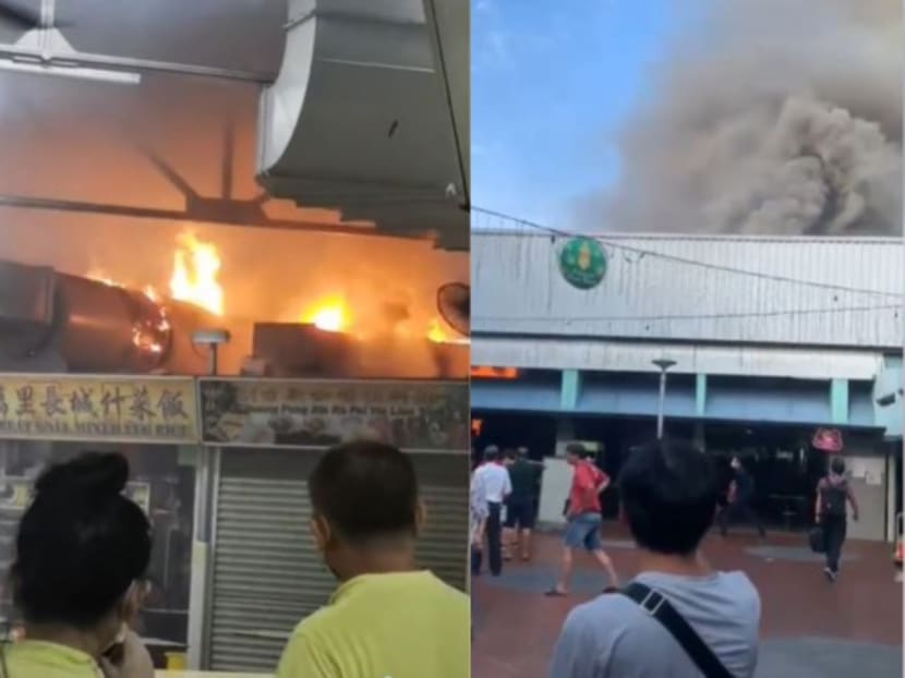 Screengrabs of video clips posted online show thick smoke billowing out of the hawker centre.