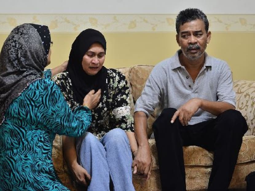 The family of stewardess Nur Sahazan Mohamed Salleh are among the many waiting for the remains of their loved ones to be brought home before Aidilfitri. Photo: The Malaysian Insider