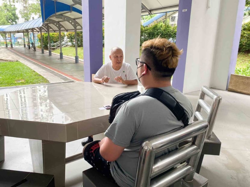 The victim’s nephew (back facing), who wanted to be known only as Mr Lee, and Mr Ng Swee Meng, brother-in-law of the deceased. The victim’s nephew (back facing), who wanted to be known only as Mr Lee, and Mr Ng Swee Meng, brother-in-law of the deceased.