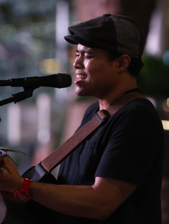 A file photograph of Mr Muhammad Firdaus Osman, one of the buskers who believes it would have been appropriate to offer remuneration to the buskers invited to play at the National Day Parade 2022.