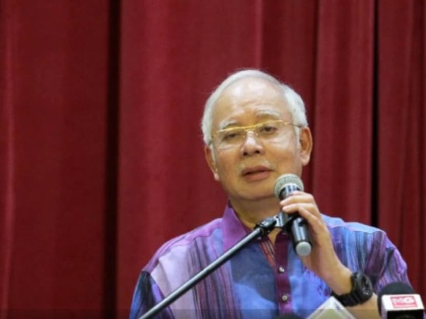 Datuk Seri Najib, seen here speaking in Pekan on Sunday (May 20), said that even though he handed over power smoothly, he was mistreated and put under immense pressure.