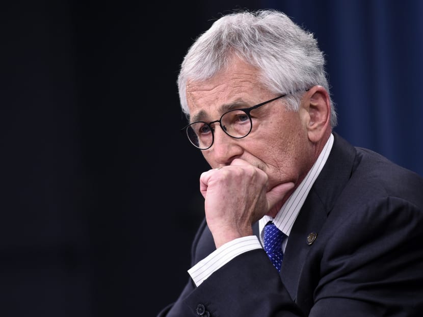 In this Oct 30, 2014, file photo, Defence Secretary Chuck Hagel listens to a question during a briefing at the Pentagon. Photo: AP