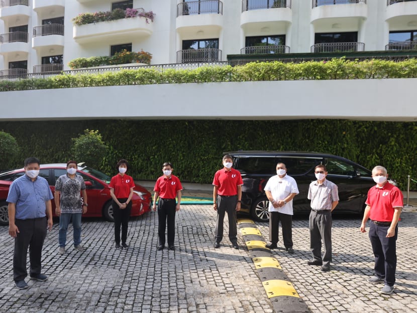 Limousine driver Mohamad Azan Salleh (third from right) met with Deputy Prime Minister Heng Swee Keat during a visit to Rasa Sentosa Resort and Spa on Feb 11, 2021.