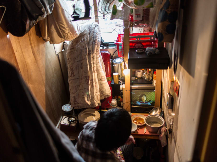 Gallery: Hong Kong's working poor choose streets over dismal housing