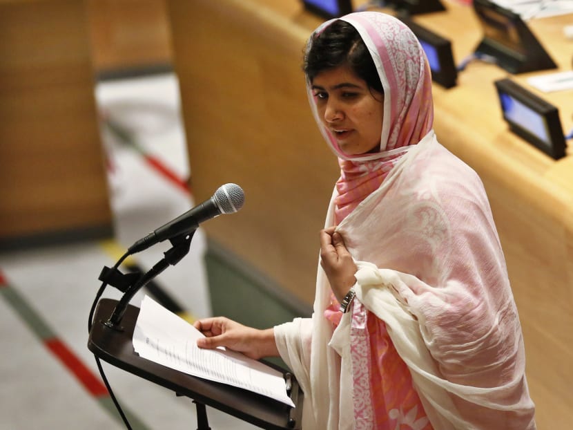 Malala Yousafzai, wearing a white shawl that had belonged to former Pakistani Prime Minister Benazir Bhutto, gives her first speech since the Taliban in Pakistan tried to kill her for advocating education for girls, at the United Nations Headquarters in New York, in this July 12, 2013 file photo. Photo: Reuters
