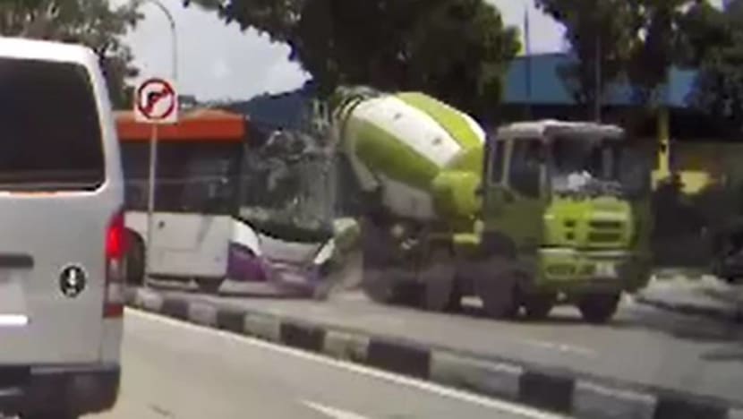 SBS Transit bus driver, 2 passengers taken to hospital after accident with cement mixer