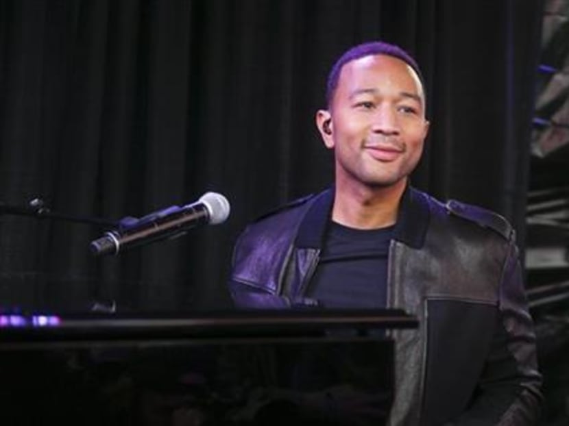 John Legend performs at the AXE White Label Collective Party during the SXSW Music Festival in Austin, Texas on Saturday, March 21, 2015. Photo: AP