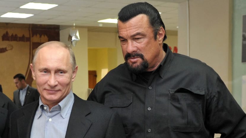 Putin gives US actor Steven Seagal Russia's top state award for 'humanitarian work' Putin gives US actor Steven Seagal Russia's top state award for 'humanitarian work'