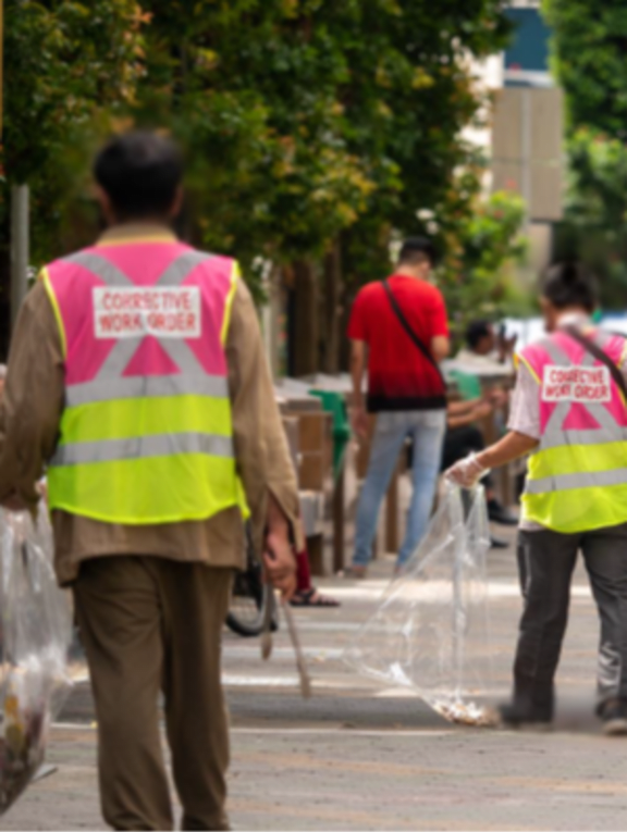 A scene from a corrective work order session in the city area of Singapore. A scene from a corrective work order session in the city area of Singapore.