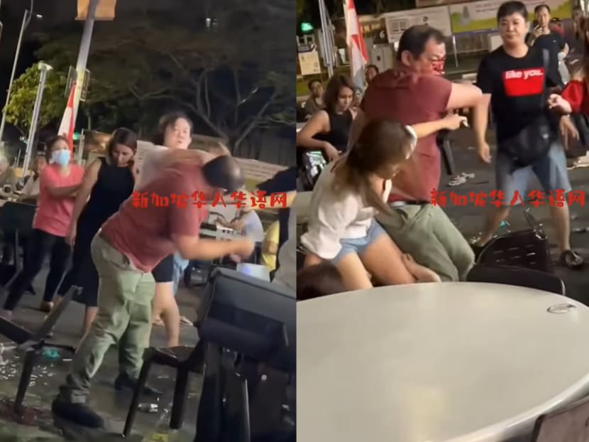 Screengrabs from a Facebook video showing a man fighting with a woman at an open-air coffee shop. Screengrabs from a Facebook video showing a man fighting with a woman at an open-air coffee shop.