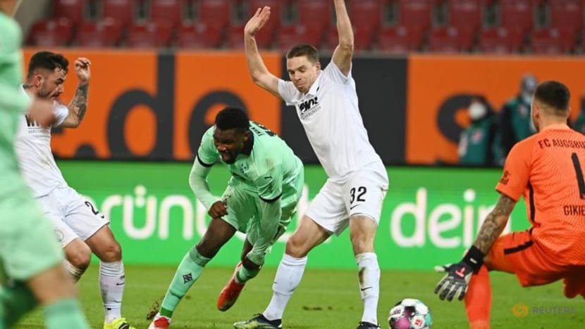 Football: Gladbach crisis deepens with 3-1 loss at Augsburg Football: Gladbach crisis deepens with 3-1 loss at Augsburg