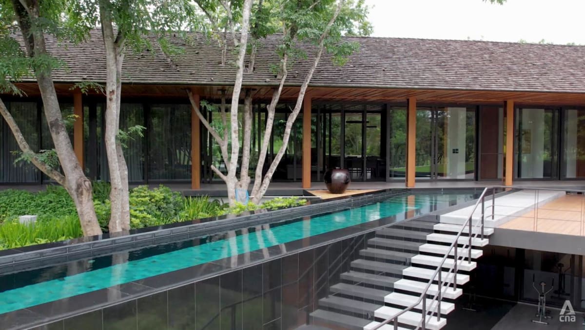 a-swimming-pool-takes-centre-stage-at-this-tropical-modernist-architecture-in-thailand