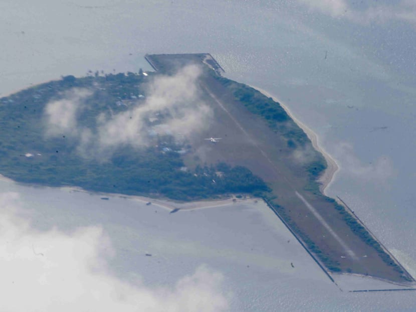 The Philippine-claimed Thitu island on the Spratlys Group of islands is shown off the disputed South China Sea in western Philippines Friday, April 21, 2017. Philippine Defense Secretray Delfin Lorenzana, Armed Forces Chief Gen. Eduardo Ano and other officials flew to Thitu Island Friday which was aimed to assert the country's claim to the heartland of a disputed area where China is believed to have added missiles on man-made islands. Photo: AP