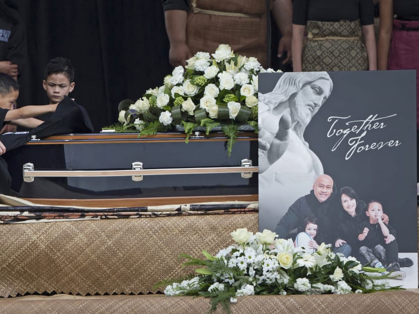 Nadene and her two boys say good bye to husband and father, ex All Black and rugby great, Jonah Lomu during a public memorial service in Auckland, New Zealand, on Nov 30,  2015. Photo: New Zealand Herald via AP