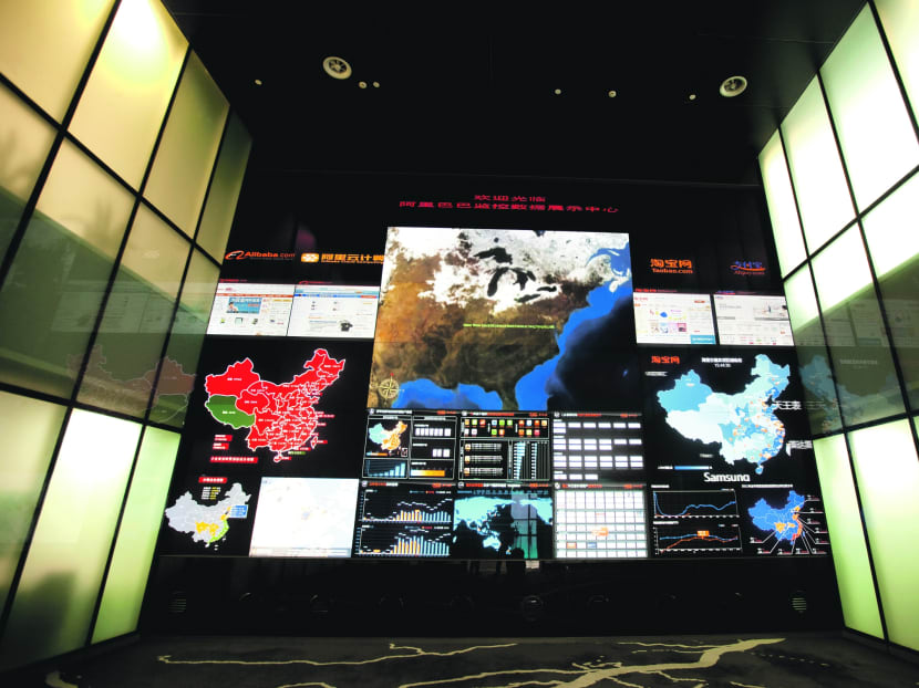 Alibaba’s monitoring room, located at its headquarters in Hangzhou province, contains a cloud computing system that tracks in real time all the business activity across the group’s major platforms, including Alibaba, Taobao and Alipay. Photo: Bloomberg