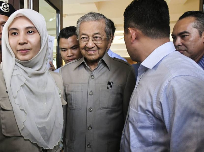 Dr Mahathir Mohamad (centre) seen at the Cheras Rehabilitation Hospital with PKR vice-president Nurul Izzah Anwar (left). Dr Mahathir has been barred from visiting jailed opposition leader Anwar Ibrahim at the hospital, with staff citing orders 'from the top'. Photo: The Malaysian Insight