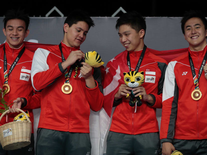 The Singapore SEA Games mens 4x100m medley relay team receiving their medals after competing on 26 August, 2017. Photo: Jason Quah/TODAY